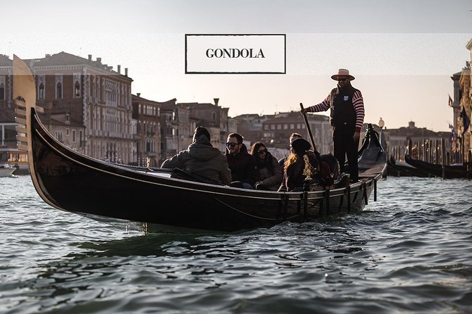 Grand Canal Gondola Experience with Live Commentary™ - A traditional boat, with shared seating