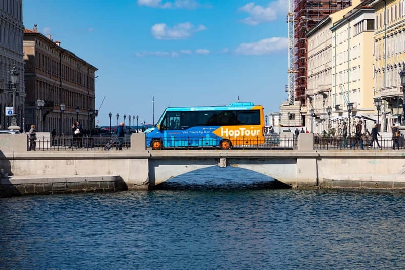 Trieste Bus Tour with Audio Guide - Audio commentary and the onboard host