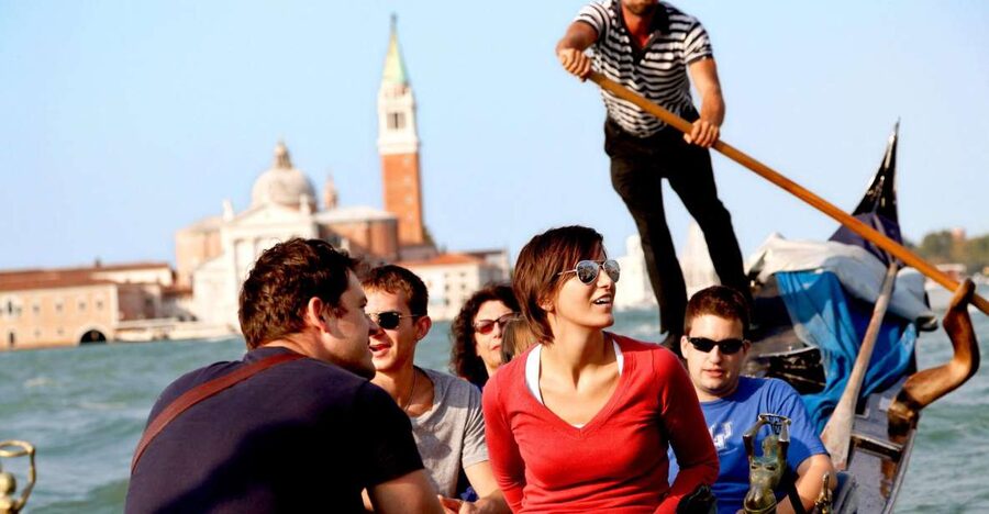 Venice: Gondola Ride with Live Guide or Audio Guide - A short walk before the water