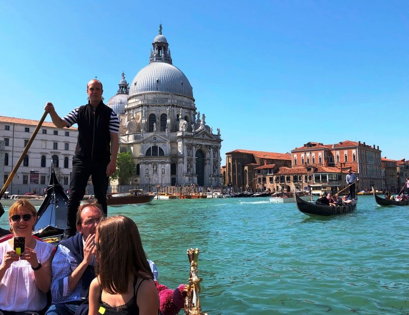 Venice: Shared Gondola Ride - The churches, theaters, and bridges along the way