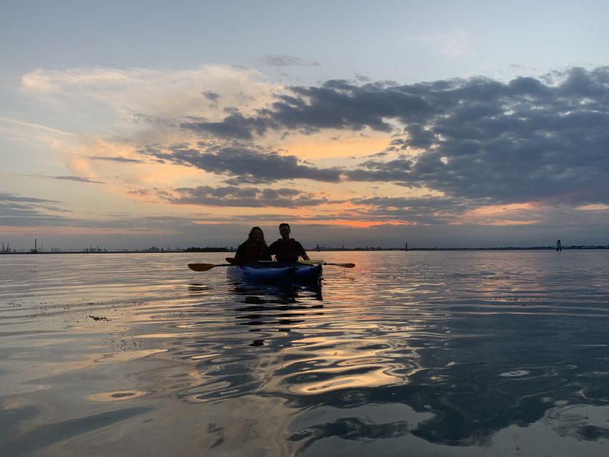 Venice: Sunset Kayak Tour in the Canals - A sunset view from the level of the water