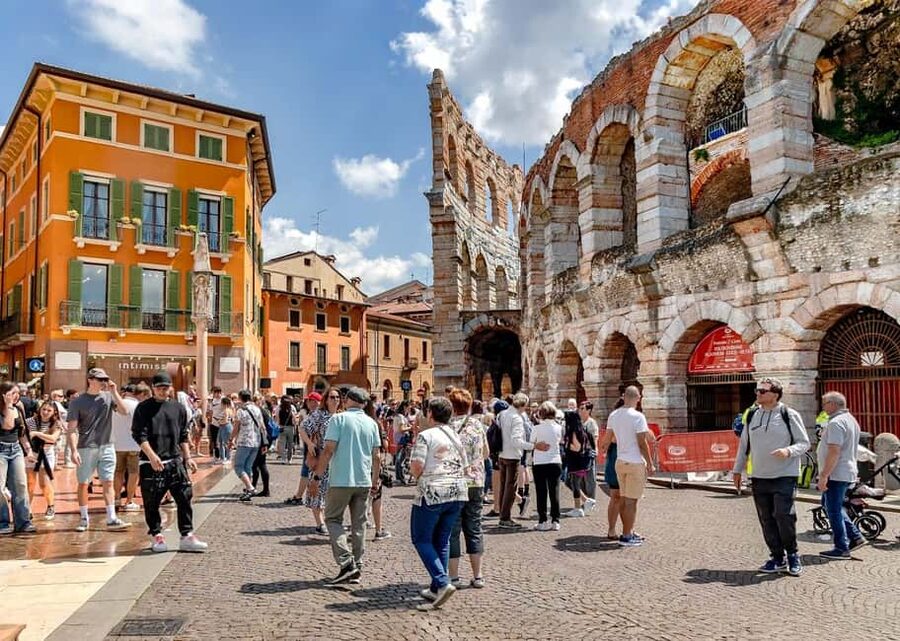 Verona: City Walking Tour with Cable Car & Wine Aperitif - Verona comes into focus from Piazza Bra